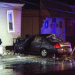 Car crash into house